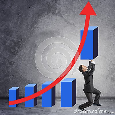 Businessman holding graphical chart Stock Photo