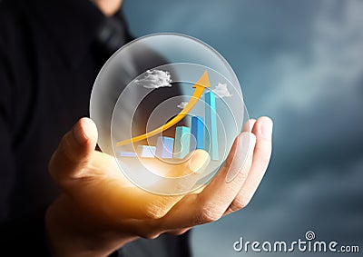 Businessman holding increasing graph in crystal ball Stock Photo