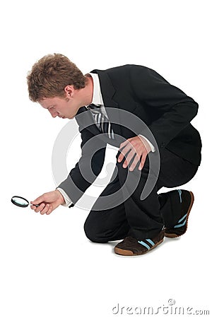 Businessman Holding Magnifying Glass Stock Photo