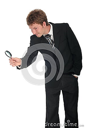 Businessman Holding Magnifying Glass Stock Photo