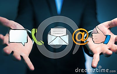 Businessman holding manuscript contact icon in his hand Stock Photo