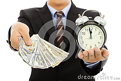 Businessman holding money and clock. time is money concept Stock Photo