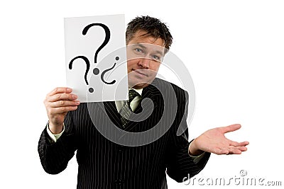 Businessman is holding question marks Stock Photo