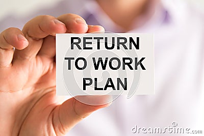 Businessman holding Returning To Work Plan message card Stock Photo