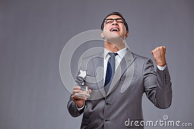 The businessman holding star award in business concept Stock Photo