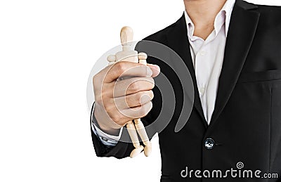 Businessman holding wooden figure, concept of take control, oppress, and etc., isolated on white background Stock Photo