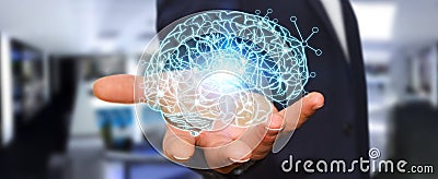 Businessman holding x-ray human brain in his hand Stock Photo