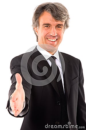 Businessman holds out his hand Stock Photo