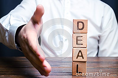 The businessman holds out his hand to make a deal. Concept of a contract or deal, making an offer. Signing or renewing a contract Stock Photo