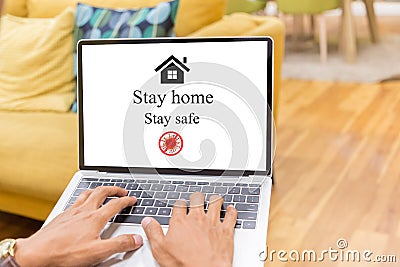 Businessman at home working with laptop,stay at home to reduce risk of infection and spreading the virus Editorial Stock Photo