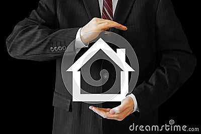 Businessman - house insurance concept Stock Photo