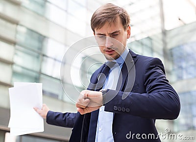 Businessman hurrying to meeting Stock Photo