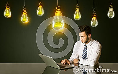 Businessman with idea bulbs Stock Photo