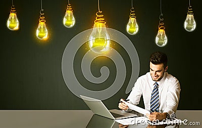 Businessman with idea bulbs Stock Photo