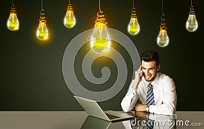 Businessman with idea bulbs Stock Photo