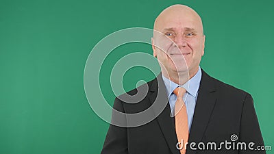 Businessman Image Smiling Happy With Green Screen in Background Stock Photo