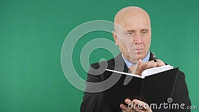 Businessman Image Using Agenda With Green Screen Background Stock Photo