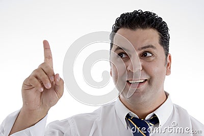 Businessman indicating upward Stock Photo