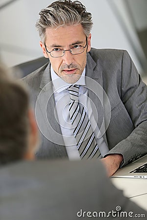 Businessman interviewing job applicant Stock Photo