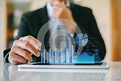 Businessman investment consultant analyzing company financial report balance statement working with digital augmented reality grap Stock Photo