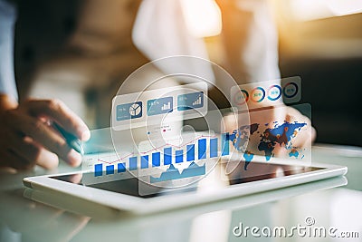 Businessman investor analyzing company financial mutual fund report working with digital augmented reality graphics technology. Co Stock Photo