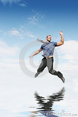 Businessman jumping Stock Photo