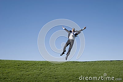 Businessman jumping Stock Photo