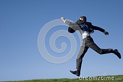 Businessman jumping Stock Photo