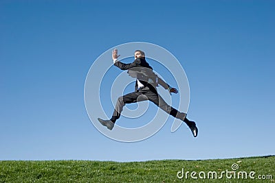 Businessman jumping Stock Photo