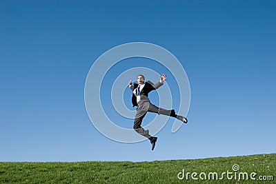 Businessman jumping Stock Photo