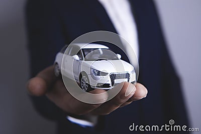 Businessman keeps car Stock Photo