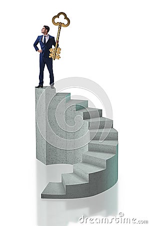 The businessman with key to success at the top of career Stock Photo