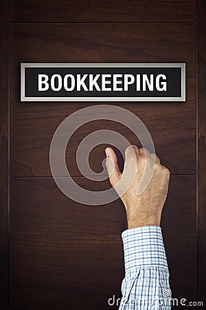 Businessman knocking on Bookkeeping office door Stock Photo