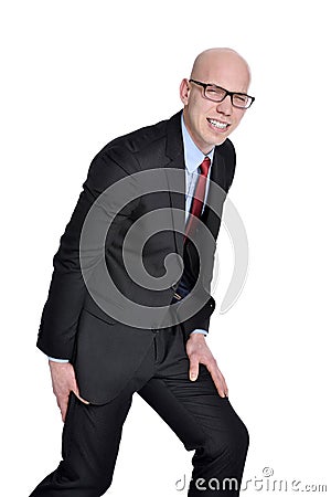 Businessman with leg pain or cramps Stock Photo