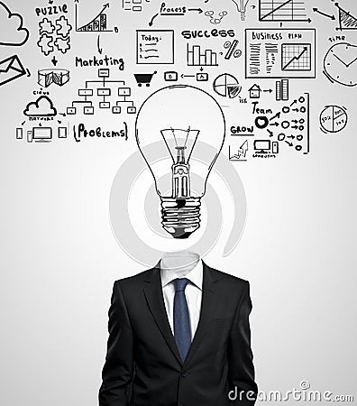 Businessman with lightbulb Stock Photo