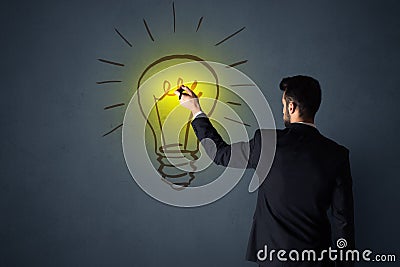 Businessman with lightbulb Stock Photo
