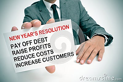 Businessman with a list of new years resolutions Stock Photo