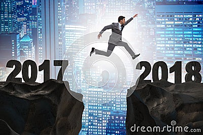 The businessman looking forward to 2018 from 2017 Stock Photo