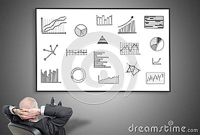 Businessman looking at graphical analysis concept Stock Photo