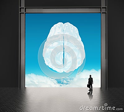 Businessman looking to brain as cloud icon Stock Photo