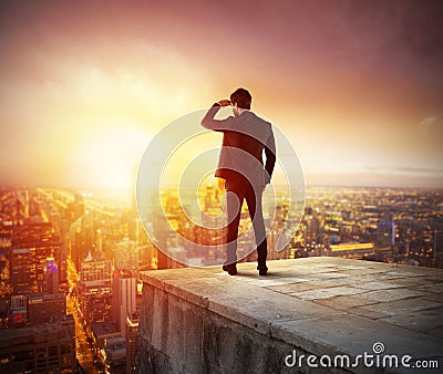 Businessman looking to the future for new business opportunity Stock Photo