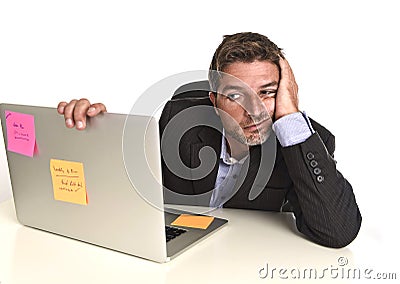 Businessman looking worried suffering stress at office laptop computer having work problem Stock Photo