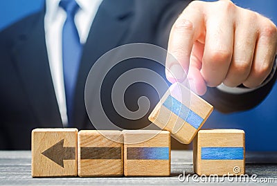 Businessman makes an addition to process to increase its effectiveness. Changes system parameters for high productivity. Stock Photo