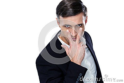 Businessman making watching you gesture Stock Photo