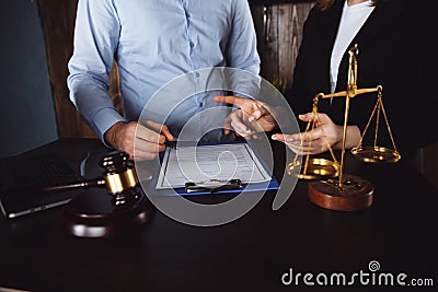 Businessman and Male lawyer or judge consult having team meeting with client, Law and Legal services concept. Stock Photo