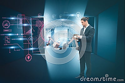 Businessman manager use tablet with interface screen display, monitoring working and control arm robotic,artificial Intelligence s Stock Photo