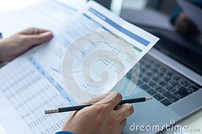 Businessman or Manager work with financial paper report Stock Photo