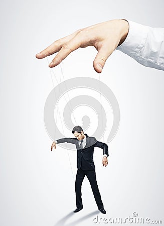 Businessman marionette Stock Photo