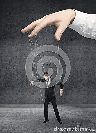 Businessman marionette Stock Photo