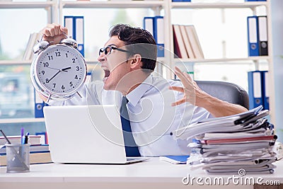 The businessman missing deadline for deliverables in office Stock Photo